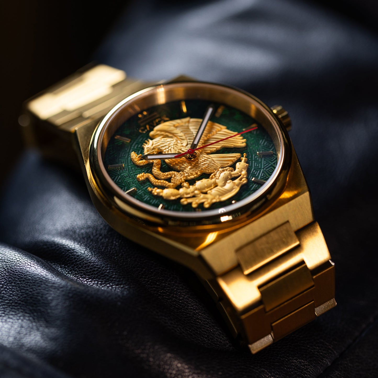 Aguila Mexicana watch with a detailed face on a dark surface